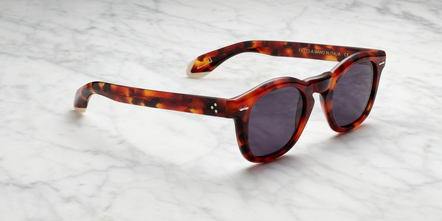 occhiale da sole color avana arancio rosso