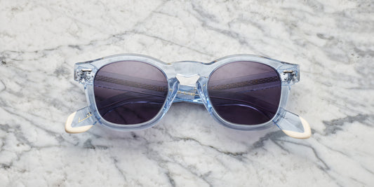 occhiali da sole in acetato trasparente azzurro