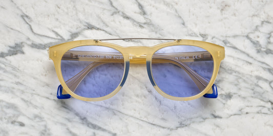 occhiali da sole in acetato trasparente color miele